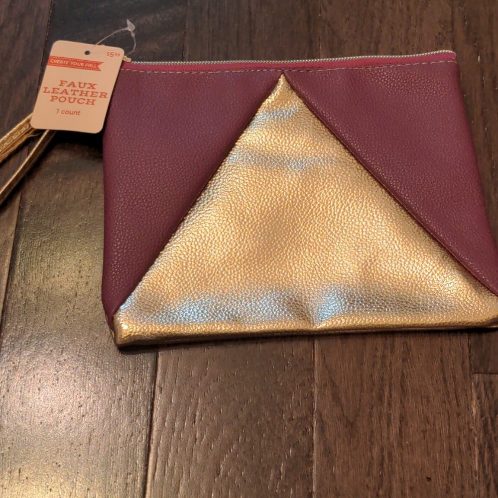 NWT two-tone rose gold faux leather wristlet